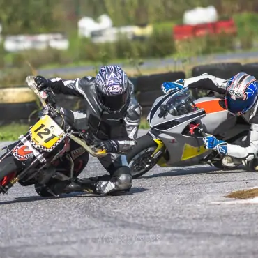 two pitbikes chasing