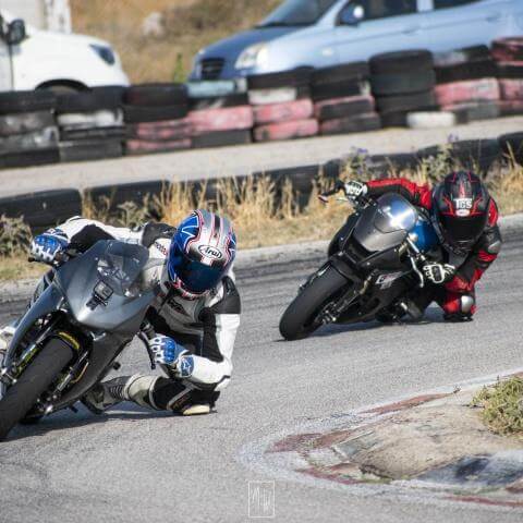 two pitbikes chasing
