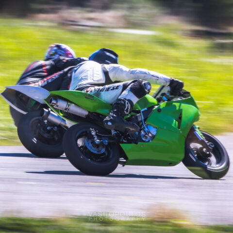 Two Riders turning side by side