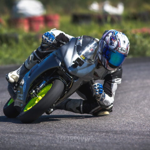 Rider with pitbike elbow down