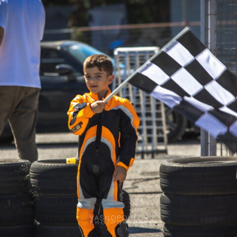 Kid hold the finish flag