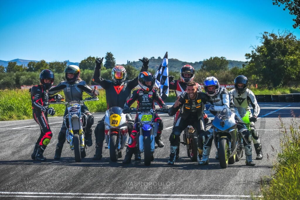 Riders at the Finish Line get a photo