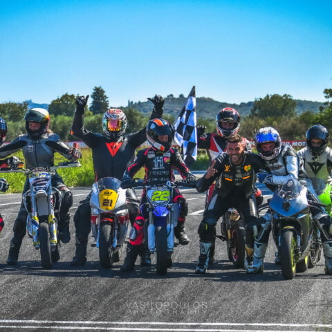 Riders at the Finish Line get a photo